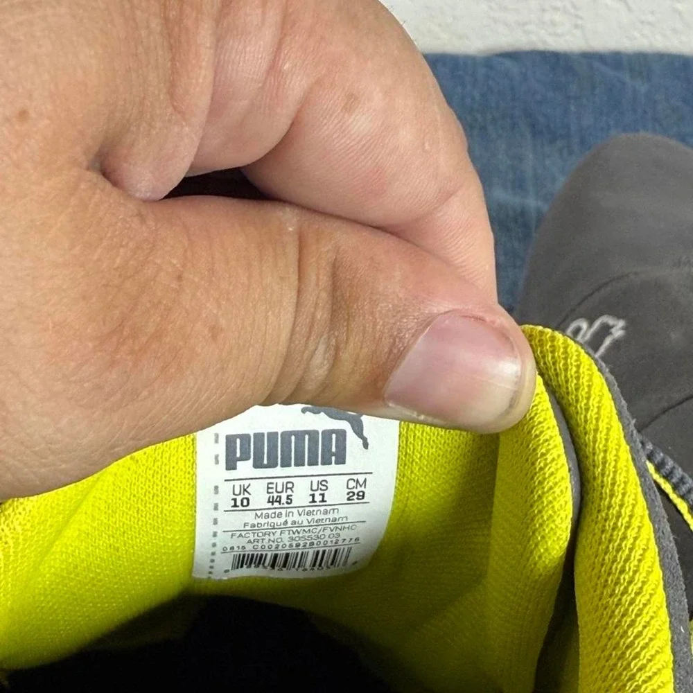 Puma black and yellow sneakers